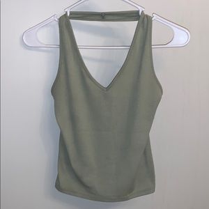 Green over the neck top.